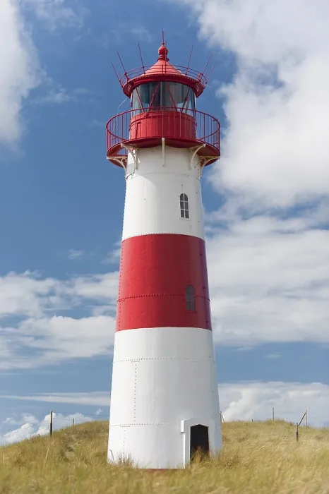 Stampa con cornice : Faro con cielo azzurro ad Ellenbogen. Stampa con cornice : Faro con cielo azzurro ad Ellenbogen.