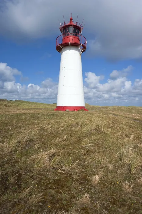Stampa con cornice : Faro con cielo azzurro ad Ellenbogen.