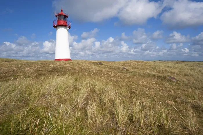 Stampa con cornice : Faro con cielo azzurro ad Ellenbogen Stampa con cornice : Faro con cielo azzurro ad Ellenbogen
