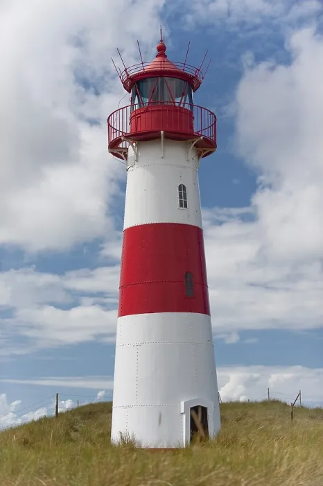 Stampa con cornice : Faro con cielo azzurro ad Ellenbogen Stampa con cornice : Faro con cielo azzurro ad Ellenbogen