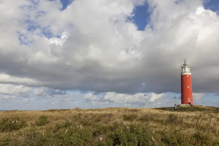 Stampa con cornice : Faro Eierland con dune. Stampa con cornice : Faro Eierland con dune.