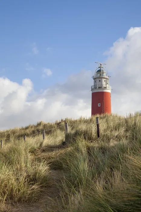Stampa con cornice : Faro Eierland con dune. Stampa con cornice : Faro Eierland con dune.