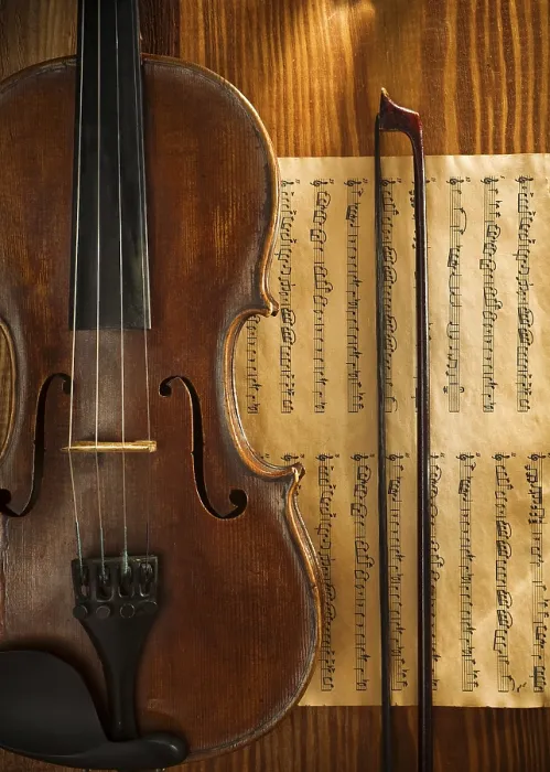 Stampa con cornice : Violino e archetto su nota. Stampa con cornice : Violino e archetto su nota.