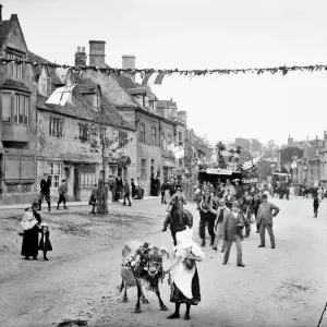Print of a Milkmaid with Calf and Floral Cart in Chipping Campden