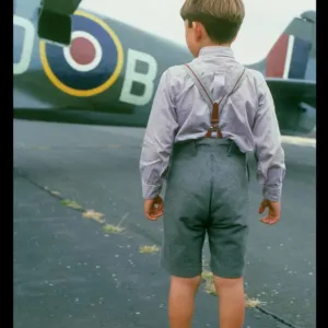 Spitfire Print: Boy Admires a Spitfire on the Runway Spitfire Print: Boy Admires a Spitfire on the Runway