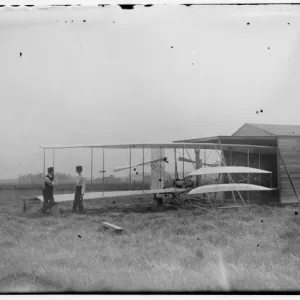 Wilbur and Orville Wright with their Second Powered Machine Print, 1904