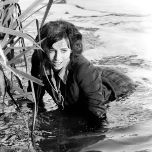 Black and white print of Cyd Hayman in the river during filming