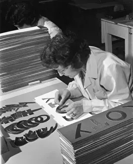 Female Factory Worker Stampe: Assembling a Sign