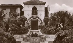 Kensington High Street History Stampe: A corner of the Spanish gardens at Derry and Toms, c. 1940s