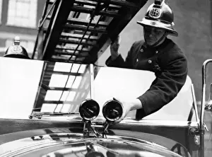 Vintage Fire Engine Stampe: Firefighter with fire engine