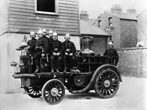 Vintage Firefighting Equipment Stampe: Firemen with early fire engine