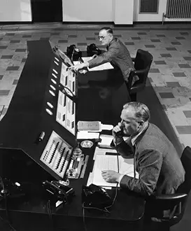 Vintage Telephone Exchange Stampe: Two Men at Work