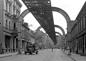 Cobblestone Road Stampe: Road with overhead structure