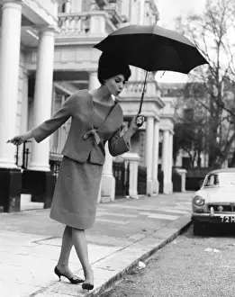 Young Woman With Umbrella Stampe: Watch your Step