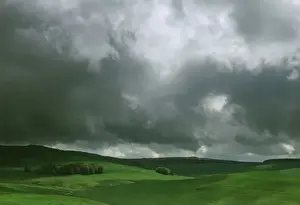 Personal Use Prints Only Stampe: Stormy Clouds over hillside