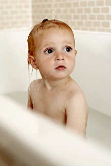Cleanliness In Childhood Stampe: Bathing child
