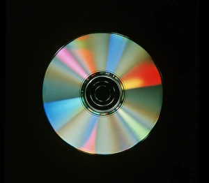 Stampe di Compact disc: fotografia di un disco compact audio Immagini datate 1993: Disco compact con interferenze di luce