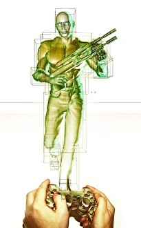 Stampe di Arte grafica del gioco video. Arte computazionale concettuale di una coppia di mani che utilizza un consolle per controllare un personaggio armato nel gioco video Immagini datate 2001 novembre: Immagine grafica di un gioco computerizzato