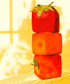 Stampe di Frutto geneticamente modificato. Immagine concettuale di un frutto quadrato: una mela, un arancia e uno strambolone per rappresentare la modifica genetica del cibo Immagini datate 1999: Immagine concettuale di frutto geneticamente ingegnerizzato