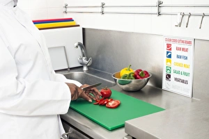 Kitchen Food Preparation Stampe: Cutting tomatoes