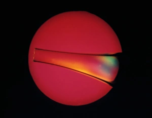 Polarised Light Micrograph Stampe: Defects in plastic, light micrograph