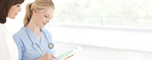 Digital Healthcare Solutions Stampe: Doctors using a tablet computer F008 / 3059