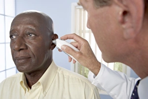 Healthcare Professional Checkup Stampe: Measuring ear temperature