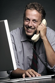 Man Working On Computer Stampe: Office worker