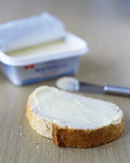 Bread Slice Stampe: Slice of buttered bread