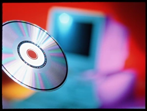 Compact Disc Storage Stampe: View of CD-ROM disc in front of personal computer