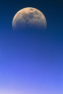 Earth Shadow On Moon Stampe: View of a partial lunar eclipse