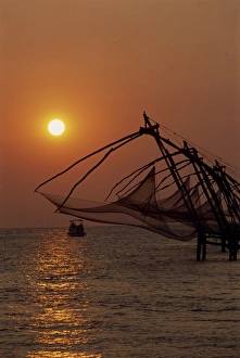 Fishing Boats At Sunset Stampe: Fishing nets at sunset