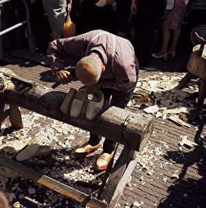 European Craftsmanship Stampe: Man making clogs
