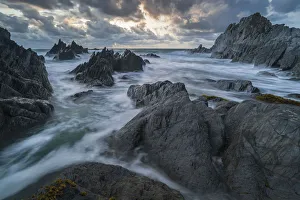 North Devon Coast Stampe: Stormy sunset over the dramatic North Devon coast, Devon, England, United Kingdom, Europe