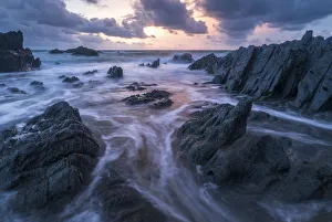 North Devon Coastline Stampe: Sunset over the dramatic coastline of North Devon, England, United Kingdom, Europe