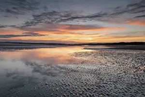 England Seaside Views Stampe: Sunset reflections on sandy beach at sunset