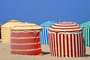 Normandy Coastal Scenery Stampe: Typical color striped beach cabins, beach and sea, Trouville sur Mer, Normandy, France