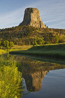 Devils Tower National Monument Stampe: Devils Tower National Monument, Wyoming, reflected in Belle Fourche River at sunrise