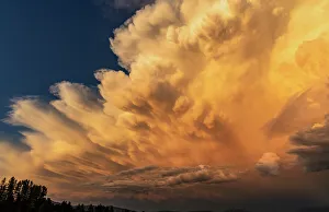 Chuck Haney Photography Stampe: Dramatic storms clouds at sunset in Whitefish, Montana, USA