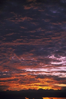 Tranquil Outdoor Scene Stampe: Sunset over clouds