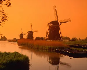 Sunset In The Netherlands Stampe: Windmills at sunset