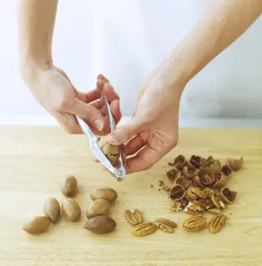 Food Preparation Techniques Stampe: Using a nutcracker to shell pecans and walnuts
