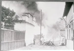 World War II Destruction Stampe: Bombs Exploding from Buildings