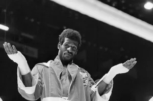 Olympic Gold Medalists Stampe: Michael Spinks Gesturing in Ring