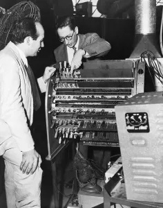 American Inventors Stampe: Scientists Work on Computer