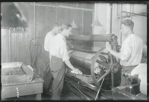 Vintage Factory Workers Stampe: Workmen Utilizing Machine
