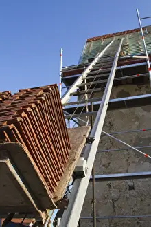 Construction Site Development Stampe: Brick elevator at a construction site