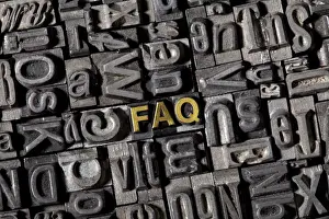 La parola FAQ, fatta di vecchi tipi in piombo.