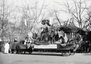 American Culture History Stampe: A parade float passing the U.S