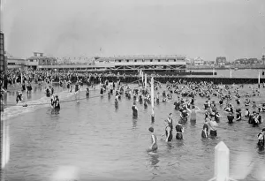 Vintage Swimming Costumes Stampe: Bathing at Brighton Beach, between c1910 and c1915. Creator: Bain News Service
